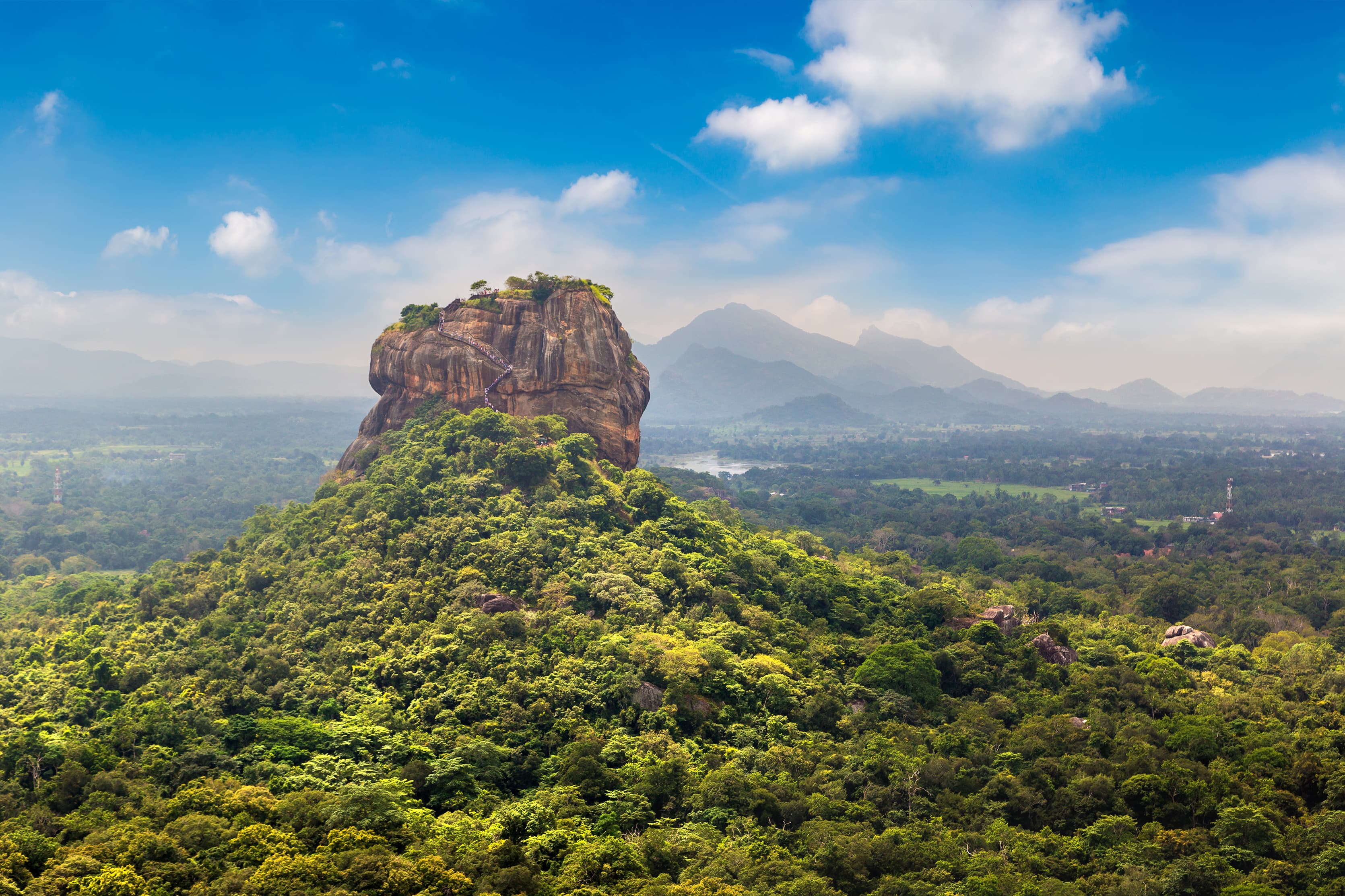 Sigiriya Rock Fortress rising above the tropical forest in Sri Lanka